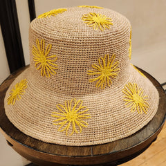 crochet raffia straw bucket hat with embroidered yellow floral