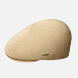 Beige flat cap on a white background
