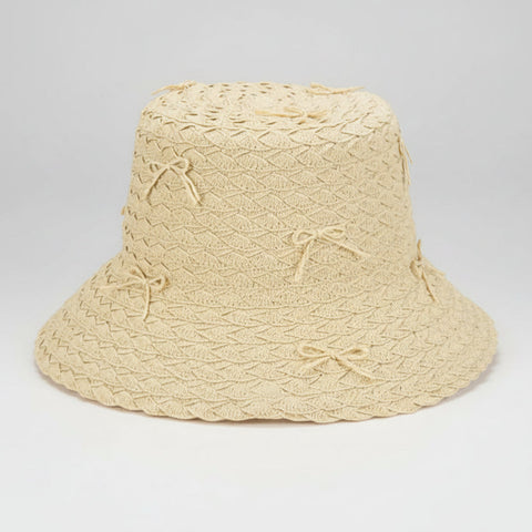 Natural Woven Bucket Hat with Bows on a white background