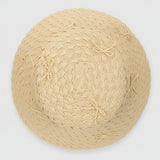 Natural Woven Bucket Hat with Bows on a white background