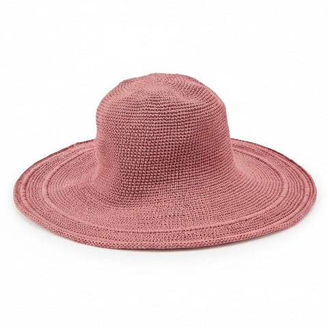 Pink cotton hat on a white background